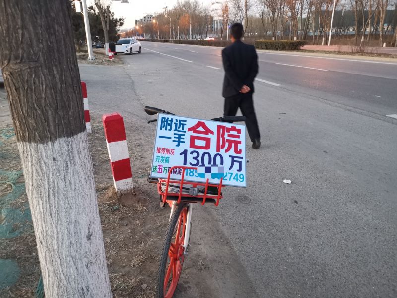 疫情下的房产经纪人:有的街头揽客 有的转行